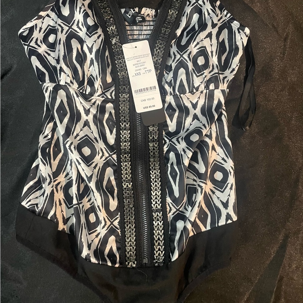 Bebe Black and White Asymmetrical Sleeveless Blouse